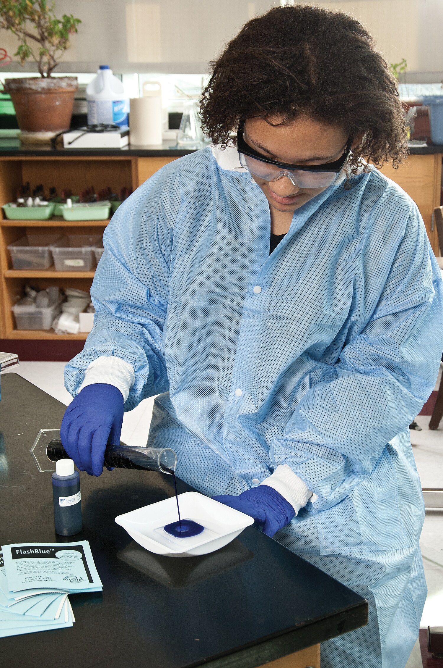 girl performing protein electrophoresis